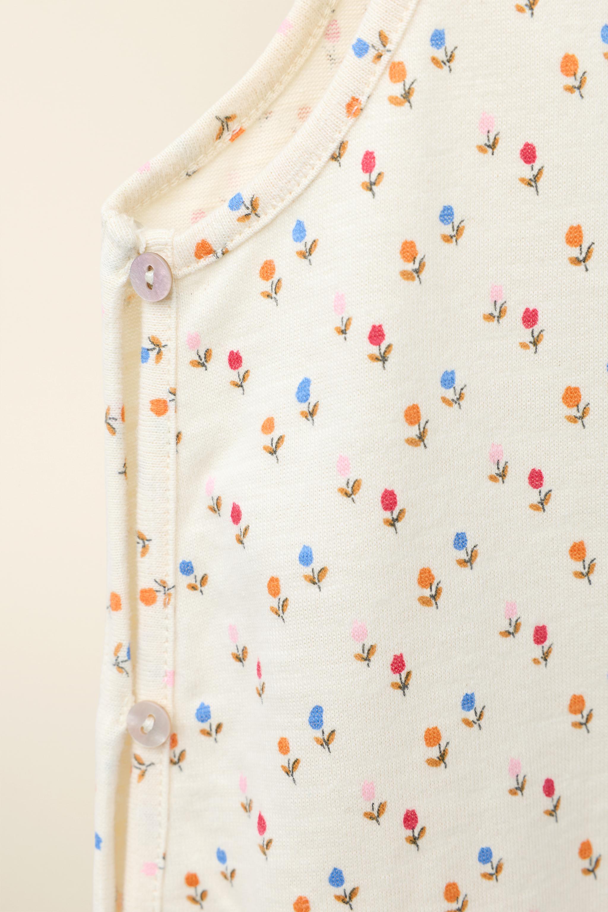 TULIP JUMPSUIT CREATED BY CARAMEL LONDON X ZARA
